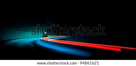 Car light trails in the tunnel. Art image . Long exposure photo taken in a tunnel below Veliko Tarnovo