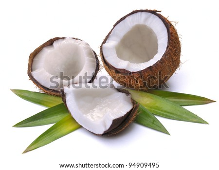 Coconut with leaves on a white background