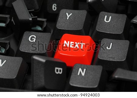 Next word on red and black keyboard button