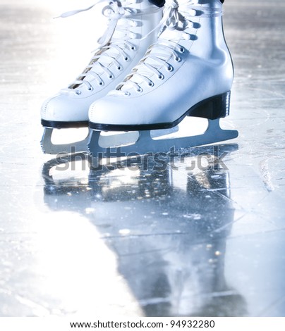 Dramatic blue portrait shot of ice skates