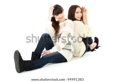 Beautiful young friends having a very good time. Portrait of asian women.