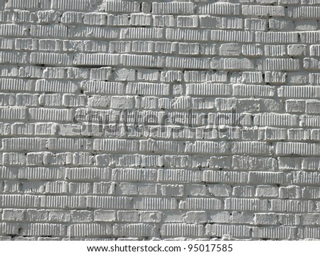 grey brick wall background at day