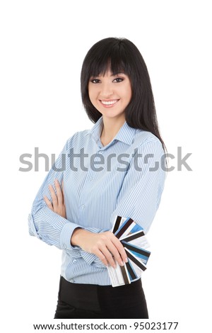 Young business woman with a bank cards, isolated on the white background