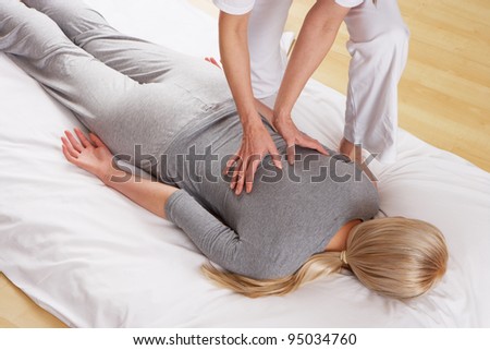 Woman having Shiatsu massage Royalty-Free Stock Photo #95034760