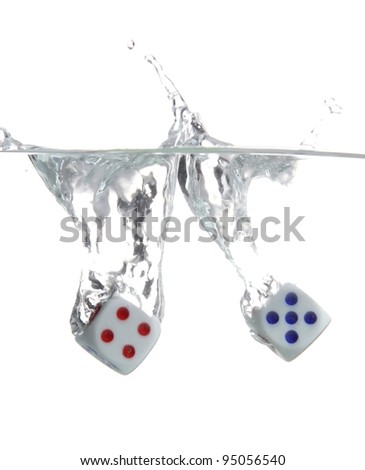 Two dice with four and five splashing into clear water