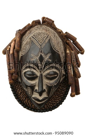 Tribal African wooden mask, used in traditional ceremonies. South African Royalty-Free Stock Photo #95089090