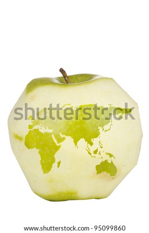 Green apple with a carving of the world map isolated on a white background.