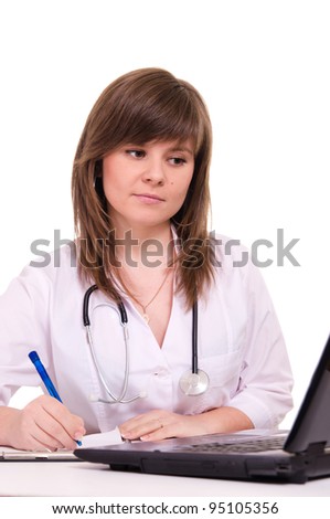 nurse sitting at the computer on a white background
