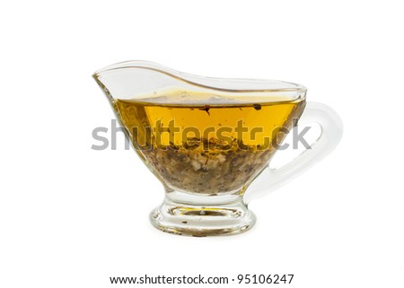 salad dressing with olive oil in glass sauce boat Royalty-Free Stock Photo #95106247
