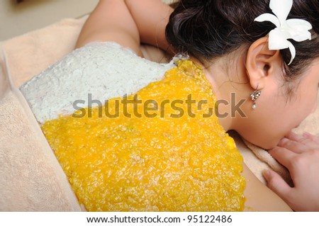 Using ointment, herbs and spices in spa treatment.