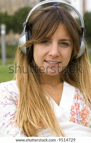 woman listening music outdoor