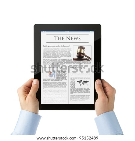 Businessman reading news at digital tablet