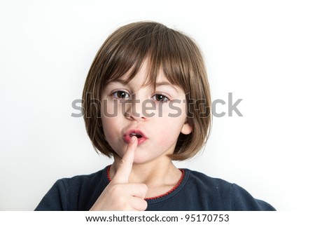 Little girl telling you to make silence
