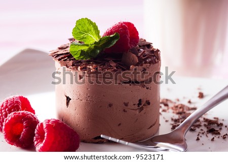 Chocolate Moose dessert on a white plate with milk Royalty-Free Stock Photo #9523171