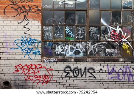Grungy alleyway in Denver Colorado with graffiti. Royalty-Free Stock Photo #95242954