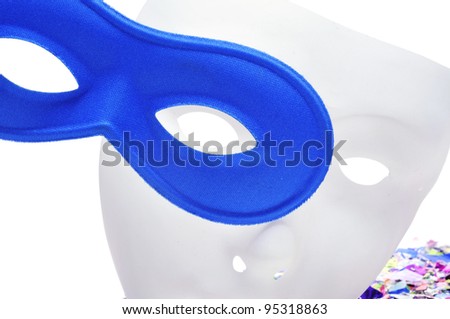 a white mask with a blue carnival mask on a white background with confetti