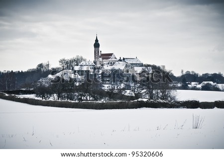 An image of the Andechs Monastery in winter scenery