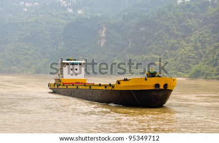 freight ship on the yangtze in china Royalty-Free Stock Photo #95349712
