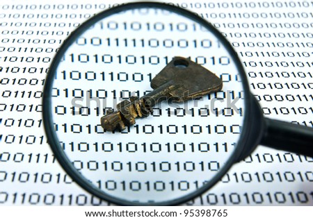 Binary code and key seen by magnifying glass