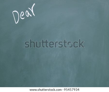 dear title written with chalk on blackboard