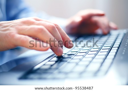 Image of man's hands typing. Selective focus Royalty-Free Stock Photo #95538487