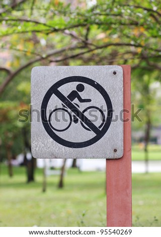 No bike riding sign in the park