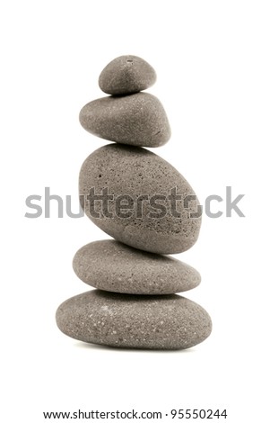The pyramid of pebbles. Isolated on white background