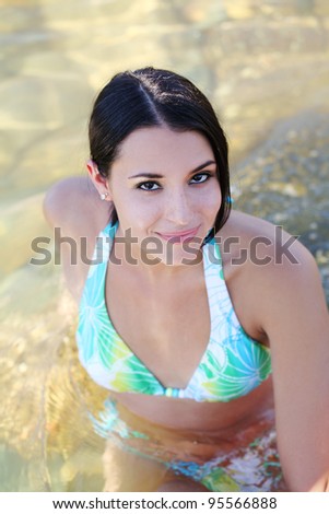 Young Attractive Dark Hair Woman in Swim Suit