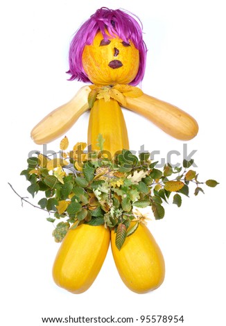 Doll made of pumpkins periwig and leaves