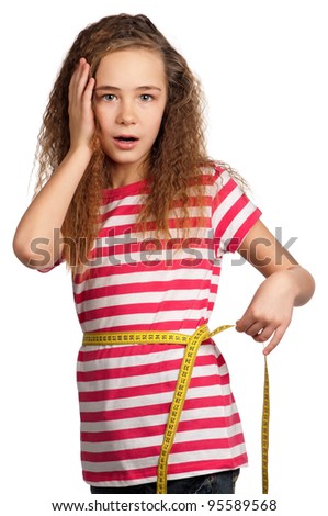 Portrait of surprised girl with yellow measure isolated on white background