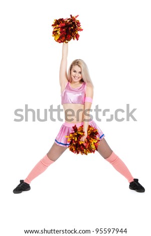 Cheerleader with pompoms, full length portrait of happy smile girl wearing pink uniform, posing isolated over white background, series photo