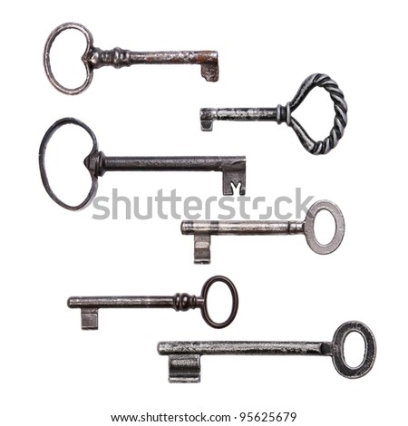 Six different old keys isolated on white