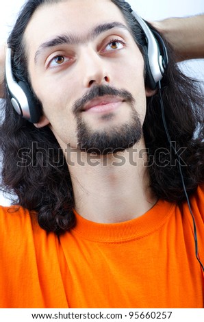 Student listening music isolated on white