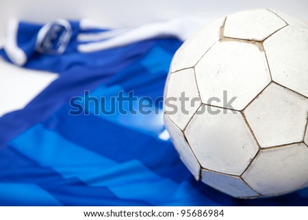 Football on blue shirt background