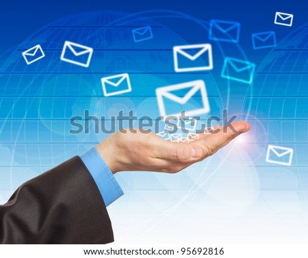 Hand with world mail delivery on map background