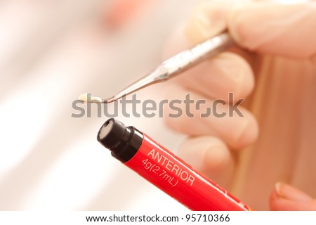 Composite filling material used in dentistry. Royalty-Free Stock Photo #95710366