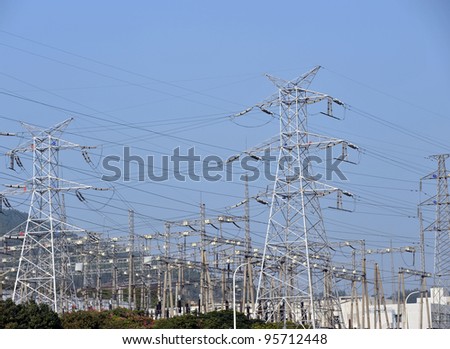 Electric power station with blue sky.