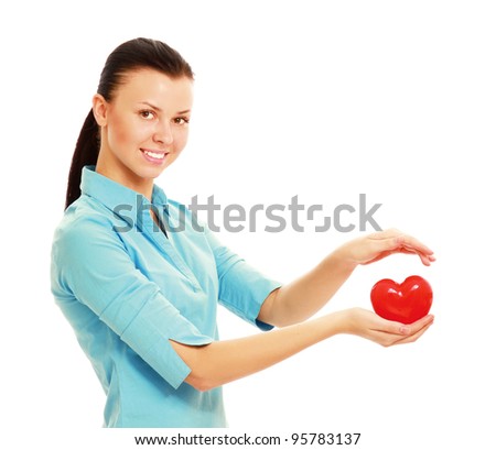Happy young woman with heart love symbol isolated on white background