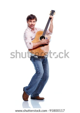 Handsome casual man with guitar. Isolated on white background.