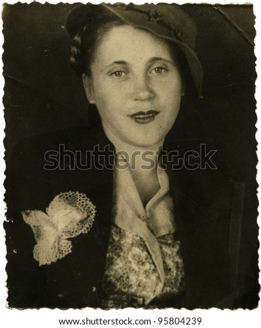USSR - CIRCA 1947: Studio portrait of a young woman in a hat, circa 1947