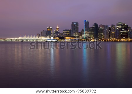 Vancouver BC City Skyline and Stanley Park along Burrard Inlet at Break of Dawn