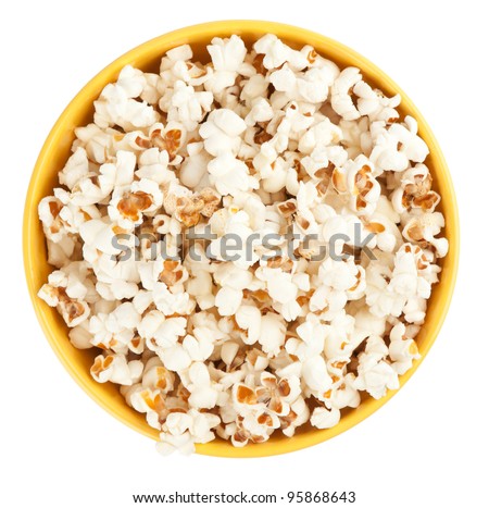 Bowl of popcorn isolated on white background. Top view Royalty-Free Stock Photo #95868643
