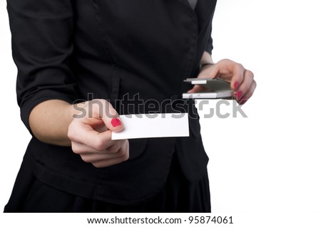Young woman holding business card isolated on white