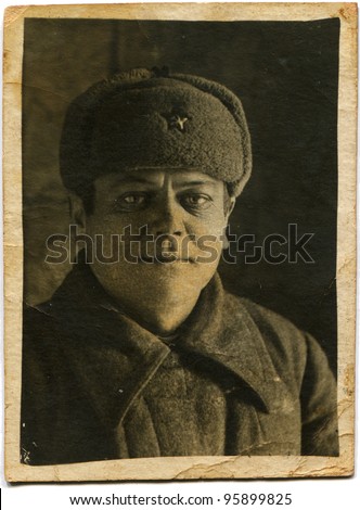 USSR - CIRCA 1942: Portrait of a soldier of the Soviet Army in winter clothes, circa 1942