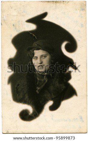 USSR - CIRCA 1939: Studio portrait of a young woman in a hat, Simferopol, Crimea, circa 1939