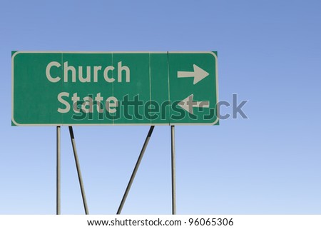 Green road sign with a blue sky gradient background.