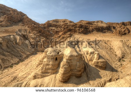 Cave of the Dead Sea Scrolls, known as Qumran cave 4, one of the caves in which the scrolls were found at the ruins of Khirbet Qumran in the desert of Israel. Royalty-Free Stock Photo #96106568