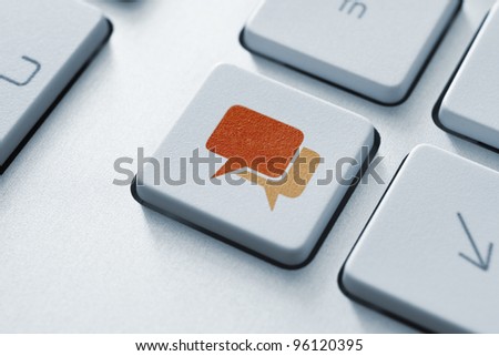 Speech bubble key button on the keyboard. Toned Image. Royalty-Free Stock Photo #96120395