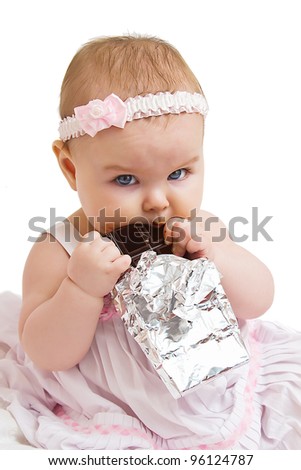 Little Girl with a chocolate bar in her hands
