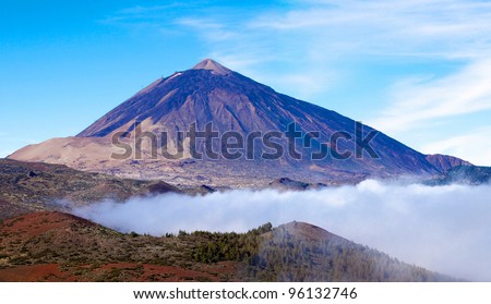 Mt teide a volcano in the canary islands with a blue sky background Royalty-Free Stock Photo #96132746